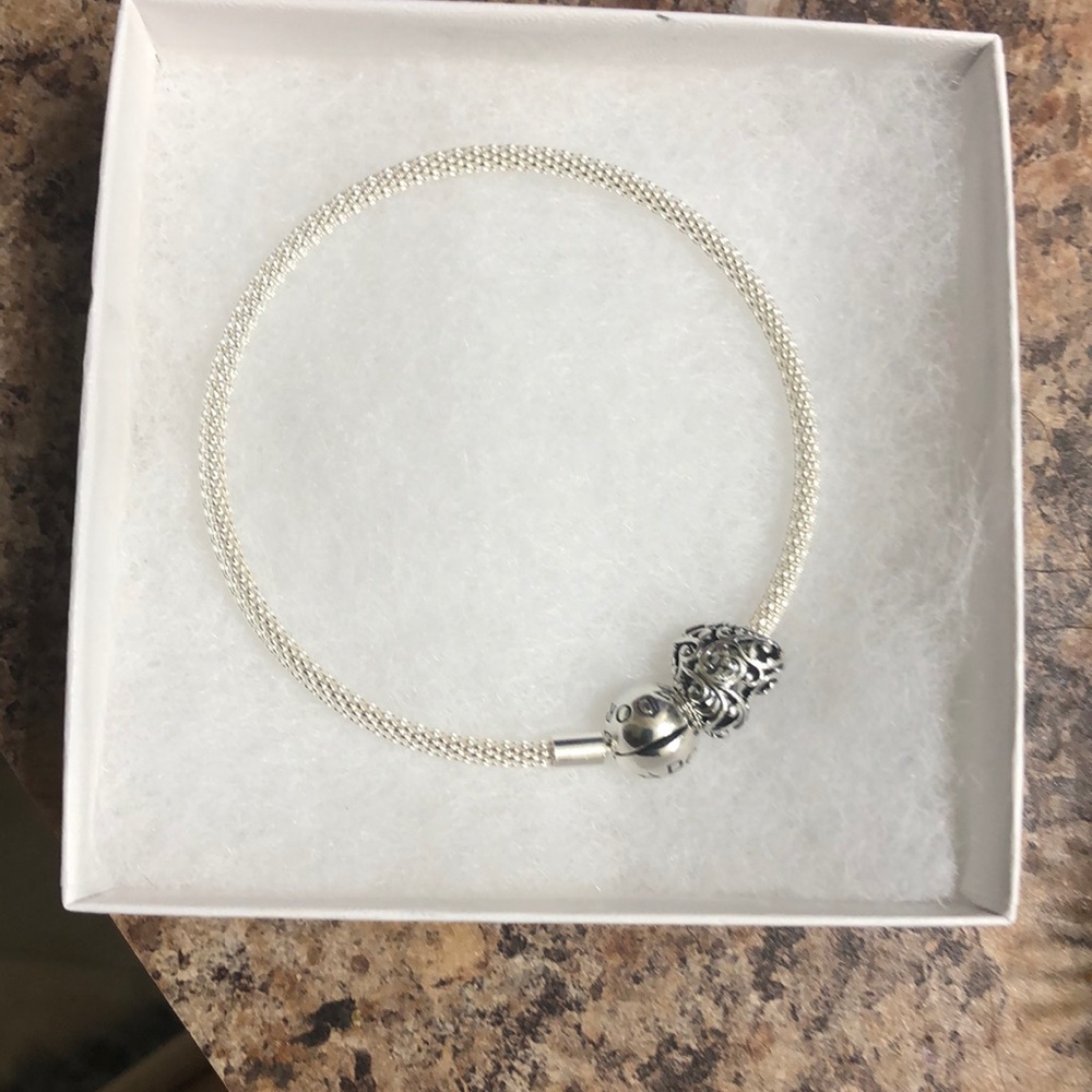 Pandora bracelet with heart jewel ( never worn )